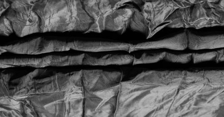 black silk fabric. WOW! This is the most luxurious silk crepe satin in the deepest shade of ebony. Using this designer fabric, you will feel undeniably luxurious as your design.の写真素材