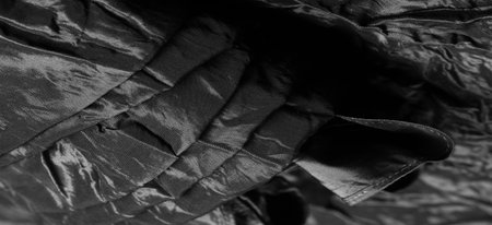 Premium black silk fabric is an exceptional fabric, beautiful on its own or as an accessory to highlight your perfect choice.の写真素材