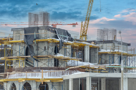 Construction of the mosque in the winter season Use of special technology and materials for construction in cold weather Careful planning and coordination to ensure effective progress,の写真素材