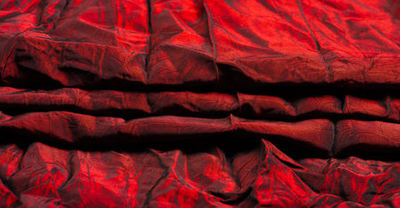 Red fabric. Representing a high quality premium red silk fabric, this superb medium weight silk has exquisite drape and beautiful sheen. This is the perfect material for your creativity.の写真素材