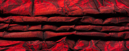 Red fabric. Rich texture, nice rough hand combined with its own visual graininess. A fresh yet supply and simple material with a variety of stripes making it the perfect choice for your design.の写真素材