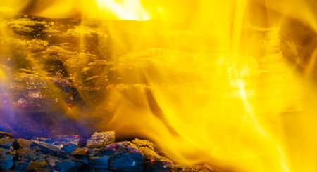 Experience the warmth and comfort of burning wood Create an energetic and lively atmosphere with a bright flame Treat yourself to a soothing atmosphere created by a flickering fireの写真素材