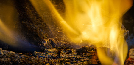 Fire in the fireplace. When we find someone attractive, our pupils dilate, sending a subconscious sign to the other person. In the warm light of a campfire, our pupils naturally dilate.の写真素材