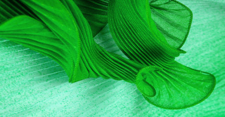 tissue, textile, cloth, fabric, web, texture, green emerald corrugation fabric, undulation ripple waveの写真素材