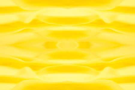 background seamless texture - yellow silk. Premium silk organza in pale yellow is an exceptional fabric, beautiful both on its own and as an accessory in terms of highlighting.の写真素材