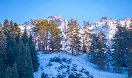 mountains winter and snow. Whether you admire the towering beauty of the mountains from afar or up close, there's no denying how enchanting they are.の写真素材