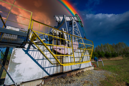Pumpjack A visual depiction of a pumping machine in thunderclouds. Unique and attractive design. Transmits the power and energy of the pumping machine.の写真素材