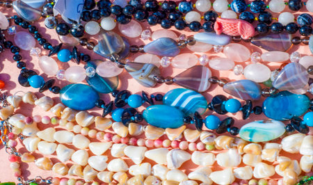 semiprecious stones. Beads pendants decoration. Semi-precious stones are hard gemstones created organically. including lava or ocean hotspots, mines and shells.の写真素材