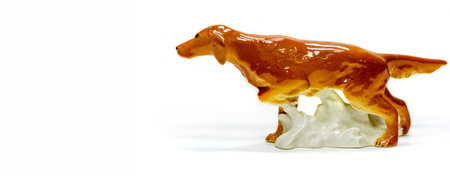 Authentic vintage American Foxhound figurine. Made from glazed ceramic for durability and aesthetic appeal. The perfect addition to any dog lover's collectible collection or home decor.の写真素材