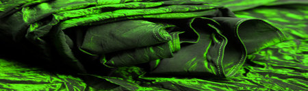 Green silk fabric. Take a look at this beautiful green silk fabric. Fluffy to look at, pleasant to the touch, and paired with your background, fabrics are perfect for all sorts of designs.の写真素材