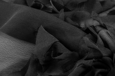 Texture. Background. Background. Black gray satin dark fabric texture luxurious shiny that is abstract silk cloth background.の写真素材