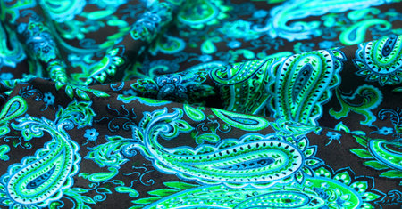 Paisley green pattern on black background In Chinese it is known as âham patternâ In Russia this pattern is known as âcucumbersâ. Boteh is a Persian word meaning bush, bunch of leaves or flower budの写真素材