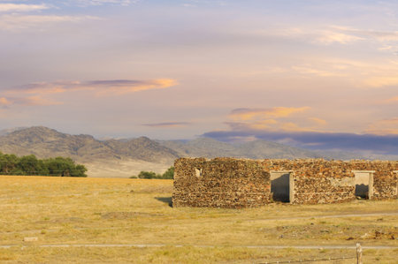 Giving glimpses of history, this weathered building is a testament to resilience. Discover the mysterious charm of a forgotten oasis where an ancient building whispers the stories of the pasの写真素材