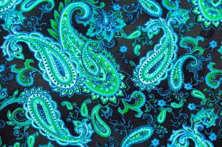 Paisley green pattern on black background In Chinese it is known as âham patternâ In Russia this pattern is known as âcucumbersâ. Boteh is a Persian word meaning bush, bunch of leaves or flower budの写真素材