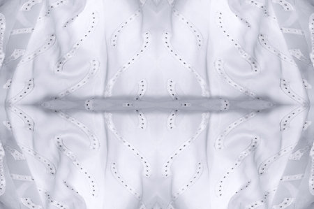 Seamless kaleidoscope. The fabric is silky white and gray. An ultra-modern print and a delicate, airy quality combine in this chiffon with an abstract silk print.の写真素材