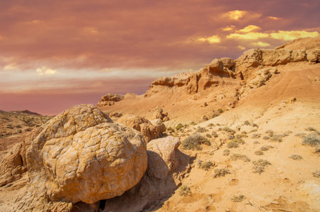 The Red Boguty Mountains offer breathtaking charm and natural beauty. The sunset over the mountains creates a golden glow that adds to its charm. This place is awe-inspiring with celestial magic.の写真素材