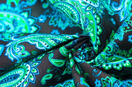 Paisley green pattern on black background In Chinese it is known as âham patternâ In Russia this pattern is known as âcucumbersâ. Boteh is a Persian word meaning bush, bunch of leaves or flower budの写真素材