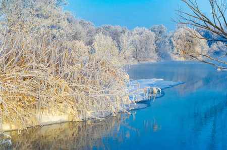 Enjoy the breathtaking beauty of the frozen river at sunrise. Witness nature's stunning winter...