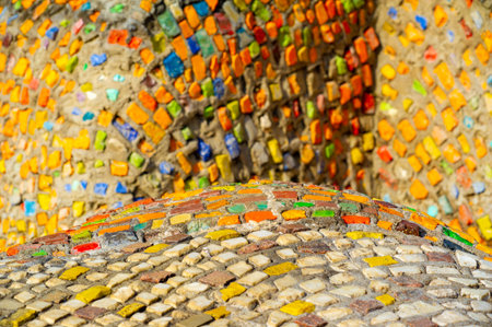 Immerse yourself in a vibrant display of creativity. The mosaic wall showcases the talents and...