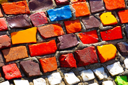 Experience the vibrant and colorful soul of the cityscape through art. Admire the intricate details and craftsmanship of the mosaic wall. A true testament to creativityの写真素材