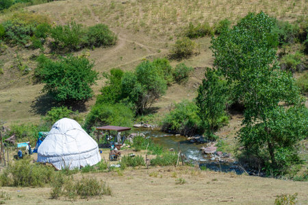 traditional Kazakh nomadic lifestyle in a shepherd's yurt. breathtaking mountain views while staying...