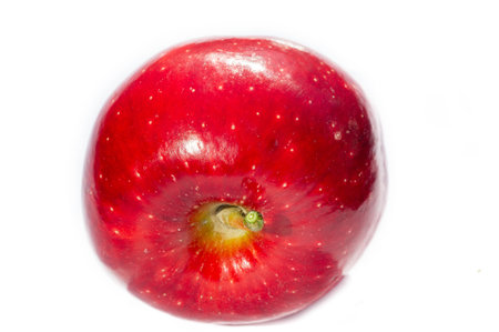 Fresh and juicy red apple Packed with essential vitamins Represents health and nutrition Ideal for snacking or adding to recipesの写真素材