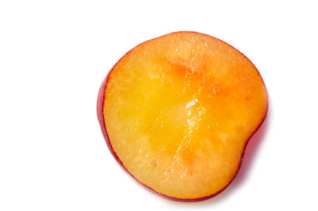 Fresh and juicy cherries on a white background. Rich in vitamins. Ideal for a healthy vegetarian diet. Ripe and tasty. A delicious snack or addition to any meal.の写真素材