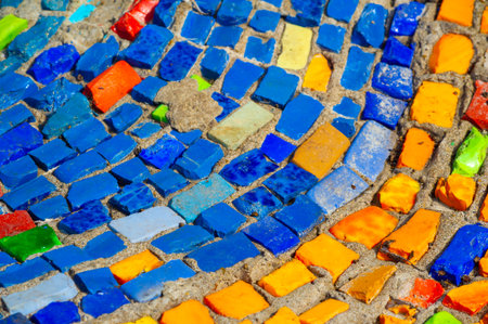 Immerse yourself in a vibrant display of creativity. The mosaic wall showcases the talents and stories of local artists. Experience the beauty of street art in a unique urban setting.の写真素材