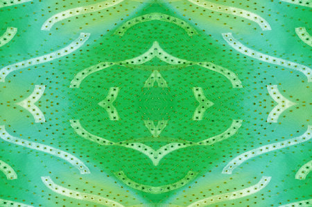 Seamless kaleidoscope. Fabric silk green-blue shades. Vibrant colors and scalloped shapes create a...