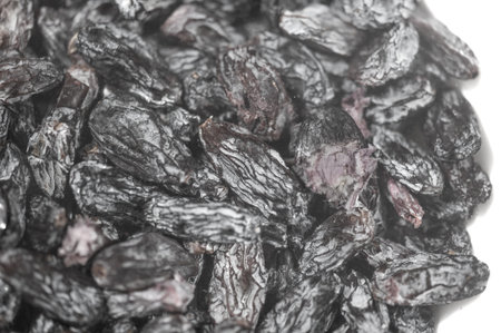 Experience the rich texture and natural sweetness of black raisins. Perfect for baking, snacking or adding to your favorite recipes. High quality image showing amazing potentialの写真素材