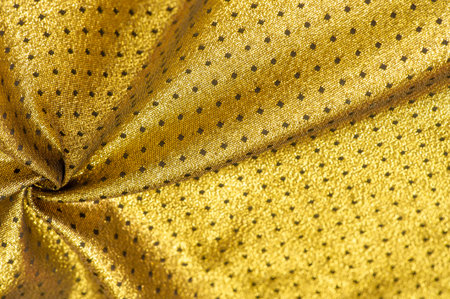 Brocade is golden in color. into a little polka. Brocade is a class of ornate shuttle fabrics, often...