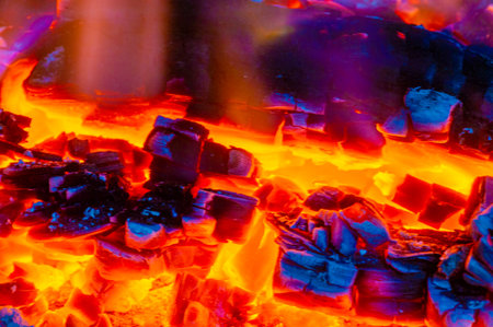 Experience the warmth and comfort of a wood burning flame Create a bright and energetic atmosphere with a bright flame. Enjoy crackling sounds and mesmerizing firewood visuals.の写真素材