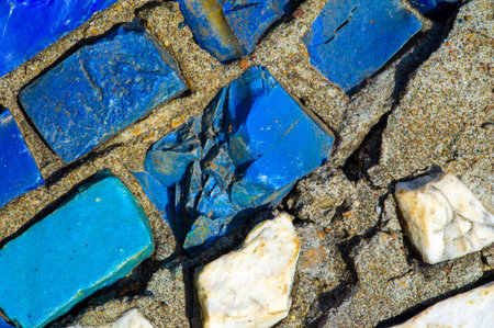 Immerse yourself in a vibrant display of mosaic tiles. Experience the creative energy of street art in the city. A visual feast for everyone who passes by.の写真素材