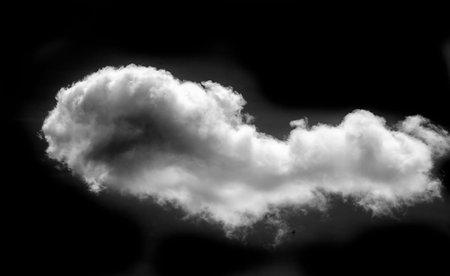 White cloud on a black background. Stunning contrast for an attractive design. Clean and minimalist aesthetics. Ideal for showing bold, vibrant colors.の写真素材