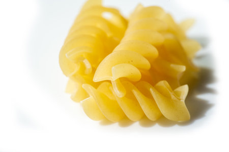 Delicious Italian fusilli made from golden wheat. Ideal for a hearty lunch or dinner. High quality pasta that will complement any dish.の写真素材