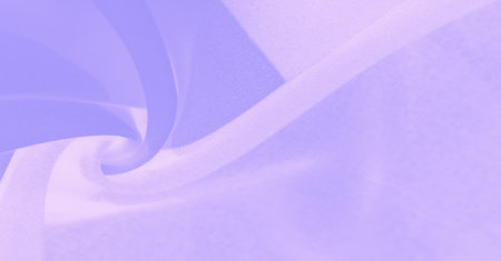 Luxurious fabric with a soft silk texture in pastel blue tones. A perfect choice for high fashion and elegant decor. Ideal for creating expressive elements in design projects.の写真素材