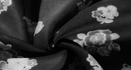 Monochrome Floral Fabric Texture for Fashion Design, Perfect for Interior Decor and Upholstery Projectsの写真素材