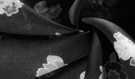 Soft Black Fabric with Elegant Floral Pattern, Ideal for Fashion, Bedding, and Upholsteryの写真素材