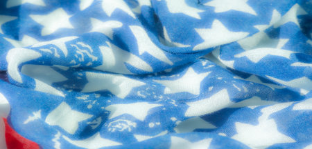 Blur, a beautifully draped fabric inspired by the American flag, displaying the patriotic colors of...
