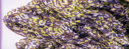 Blur of vivid yellow and purple swirls creates a visually striking design on this fabric. The...