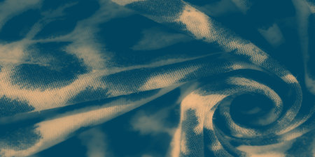 Blur showcases the detailed animal-print design on the fabric, with light and shadow playing across its textured surface, giving it depth and a natural aesthetic.の写真素材