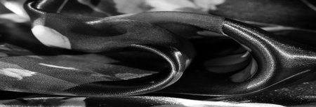 Blur, this black and white floral fabric with fine detailing and layered textures brings a subtle, artistic touch to decor, blending classic elegance with modern sophistication.の写真素材