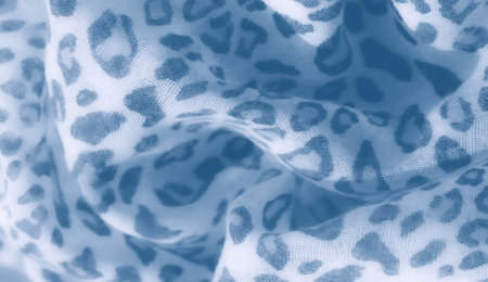 Blur - Artistic blue fabric with a leopard-inspired pattern. The softly blurred design adds a refined and modern look, perfect for elegant interior and fashion concepts.の写真素材