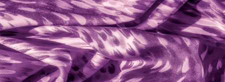Blurred view of purple fabric with an artistic abstract design, capturing soft waves and subtle...
