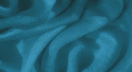 Blur, this blue fabric displays an intricate flow of folds and creases, offering a soft and elegant...