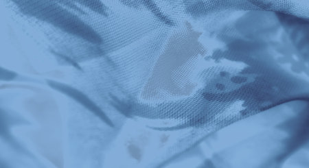 Blur Elegant blue fabric with soft, translucent waves and delicate mesh textures, capturing a refined, ethereal ambiance. Perfect for backgrounds and abstract textile themes.の写真素材