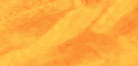 Blur. Yellow fabric showing swirling floral patterns, flowing with subtle elegance. The soft texture...