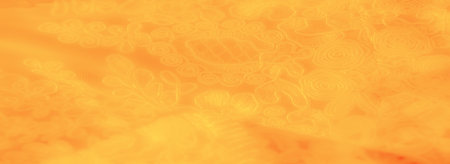 Blur â A vibrant yellow fabric with intricate swirling and floral patterns, offering warmth and an artistic touch, perfect for abstract design and decorative backgrounds.の写真素材