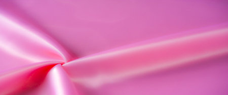 Blur. A soft and smooth pink fabric with delicate folds, creating a gentle flow and a subtle, luxurious sheen. The texture emphasizes a silky, feminine appeal, perfect for design and fashionの写真素材