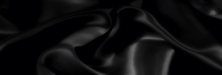 Blur An artistic grayscale fabric drape captured in soft focus, showing intricate folds and a smooth, refined texture, exuding elegance and minimalism in every detail.の写真素材